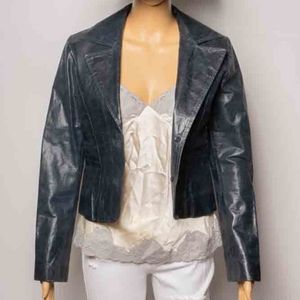 Vintage jacket in the most fabulous shade of blue leather. Cropped/ fitted.
